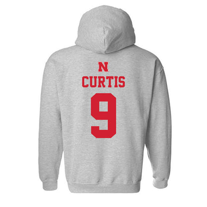 Nebraska - NCAA Men's Basketball : Leo Curtis - Sports Shersey Hooded Sweatshirt-1