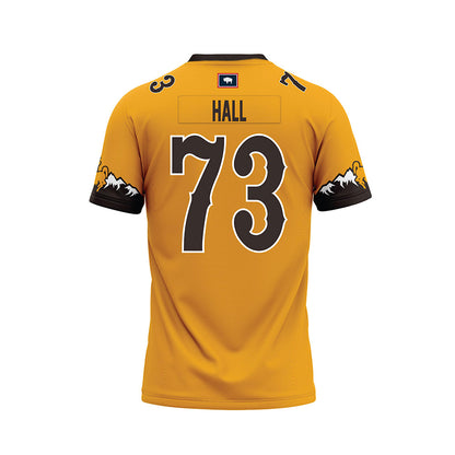 Wyoming - NCAA Football : Caleb Hall - Gold Premium Football Jersey-1