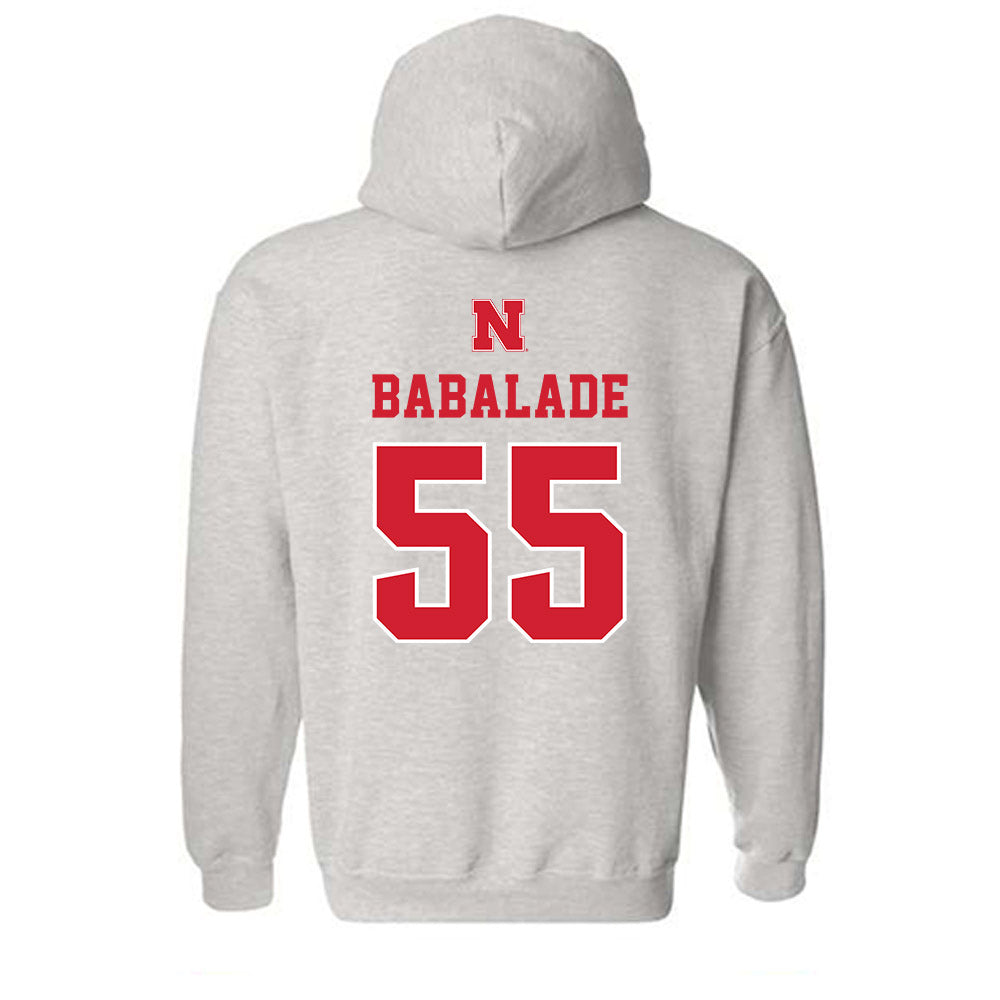 Nebraska - NCAA Football : Tree Babalade - Classic Shersey Hooded Sweatshirt-1