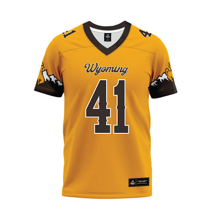 Wyoming - NCAA Football : Mason Wright - Gold Premium Football Jersey-0