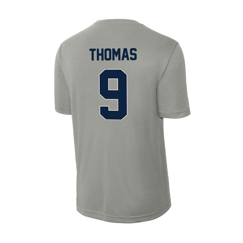 Xavier - NCAA Women's Volleyball : Quinci Thomas - Activewear T-Shirt-1