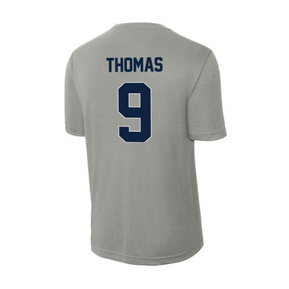 Xavier - NCAA Women's Volleyball : Quinci Thomas - Activewear T-Shirt-1