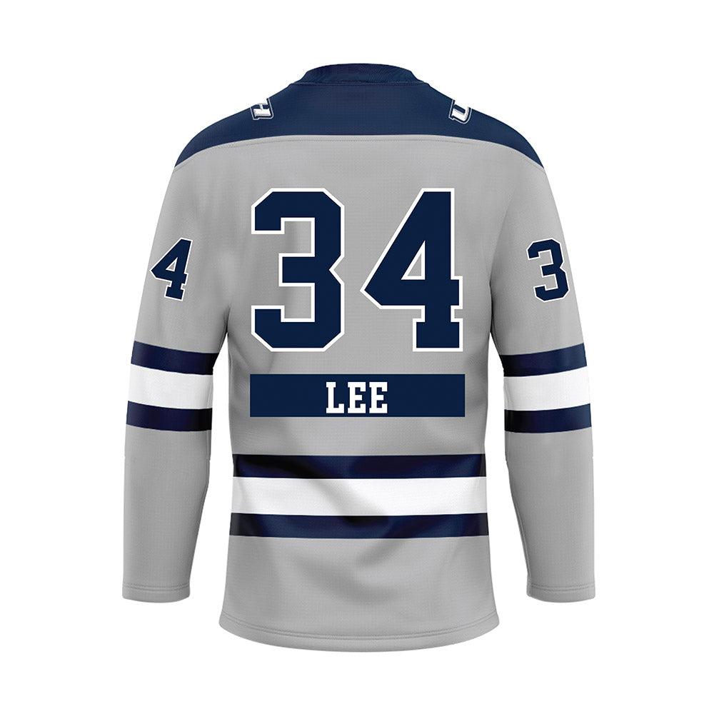 UNH - NCAA Women's Ice Hockey : Vera Lee - White Hockey Jersey-1