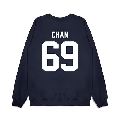 UConn - NCAA Football : Ty Chan - Vintage Helmet Premium Crewneck Sweatshirt-1