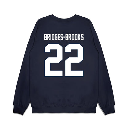 UConn - NCAA Football : Axavier Bridges-Brooks - Vintage Helmet Premium Crewneck Sweatshirt-1