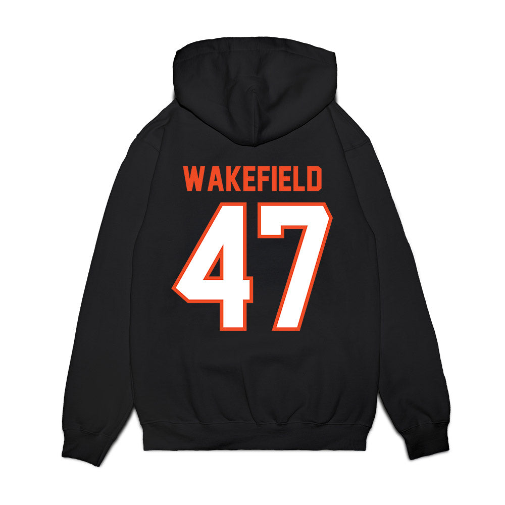 Auburn - NCAA Football : Travis Wakefield - Vintage Helmet Premium Hooded Sweatshirt-1