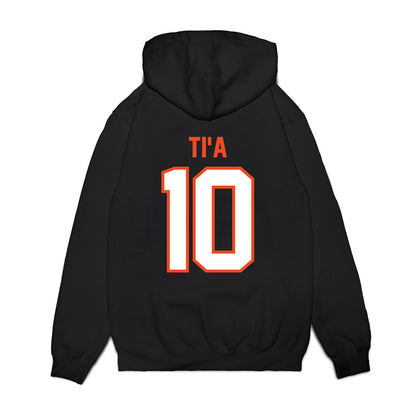 Auburn - NCAA Football : Tristan Ti'a - Vintage Helmet Premium Hooded Sweatshirt-1