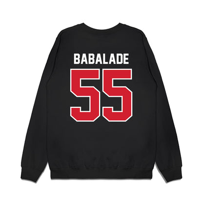 Nebraska - NCAA Football : Tree Babalade - Vintage Helmet Premium Crewneck Sweatshirt-1