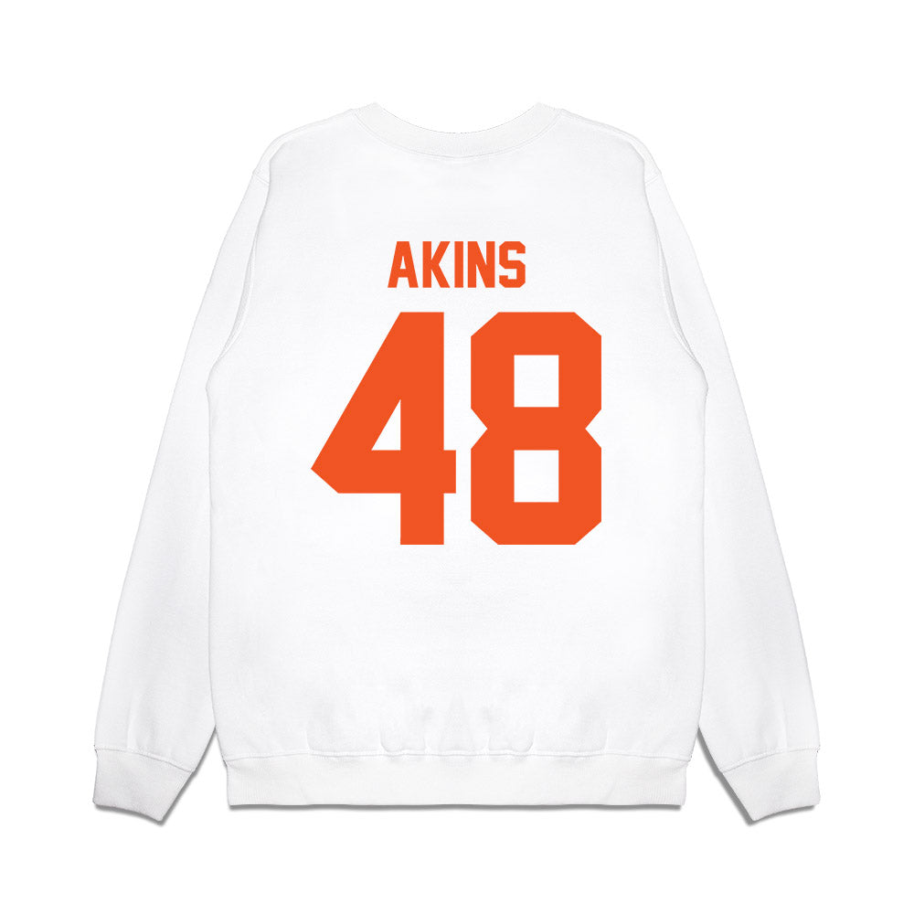 Oklahoma State - NCAA Football : Nolan Akins - Vintage Helmet Premium Crewneck Sweatshirt-1