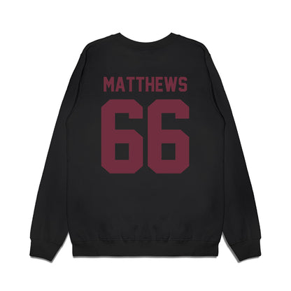 Mississippi State - NCAA Football : Jaelyne Matthews - Vintage Helmet Premium Crewneck Sweatshirt-1