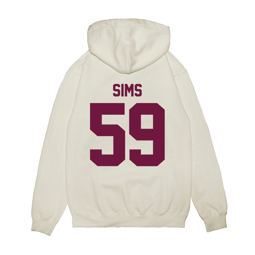 Texas A&M - NCAA Football : Chace Sims - Vintage Helmet Premium Hooded Sweatshirt-1