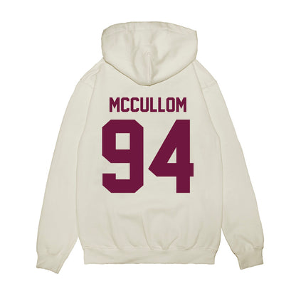 Texas A&M - NCAA Football : Angelo McCullom - Vintage Helmet Premium Hooded Sweatshirt-1