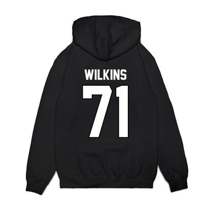 Wisconsin - NCAA Football : Pj Wilkins - Vintage Helmet Premium Hooded Sweatshirt-1