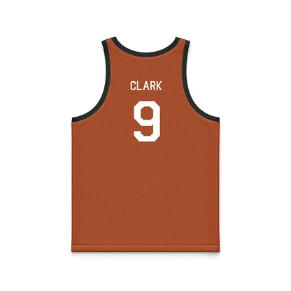 Texas - NCAA Men's Basketball : John Clark - Orange Hardwood Basketball Jersey-1