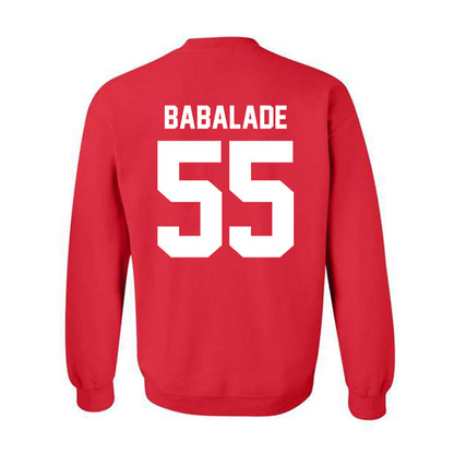 Nebraska - NCAA Football : Tree Babalade - Classic Shersey Crewneck Sweatshirt-1