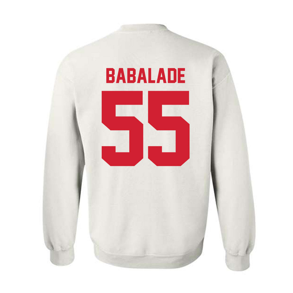 Nebraska - NCAA Football : Tree Babalade - Classic Shersey Crewneck Sweatshirt-1