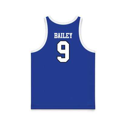 UNC Asheville - NCAA Men's Basketball : Ian Bailey - Royal Basketball Jersey-1
