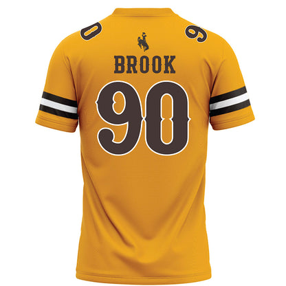 Wyoming - NCAA Football : Cade Brook - Gold Football Jersey-1