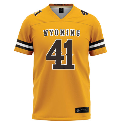 Wyoming - NCAA Football : Mason Wright - Gold Football Jersey-0